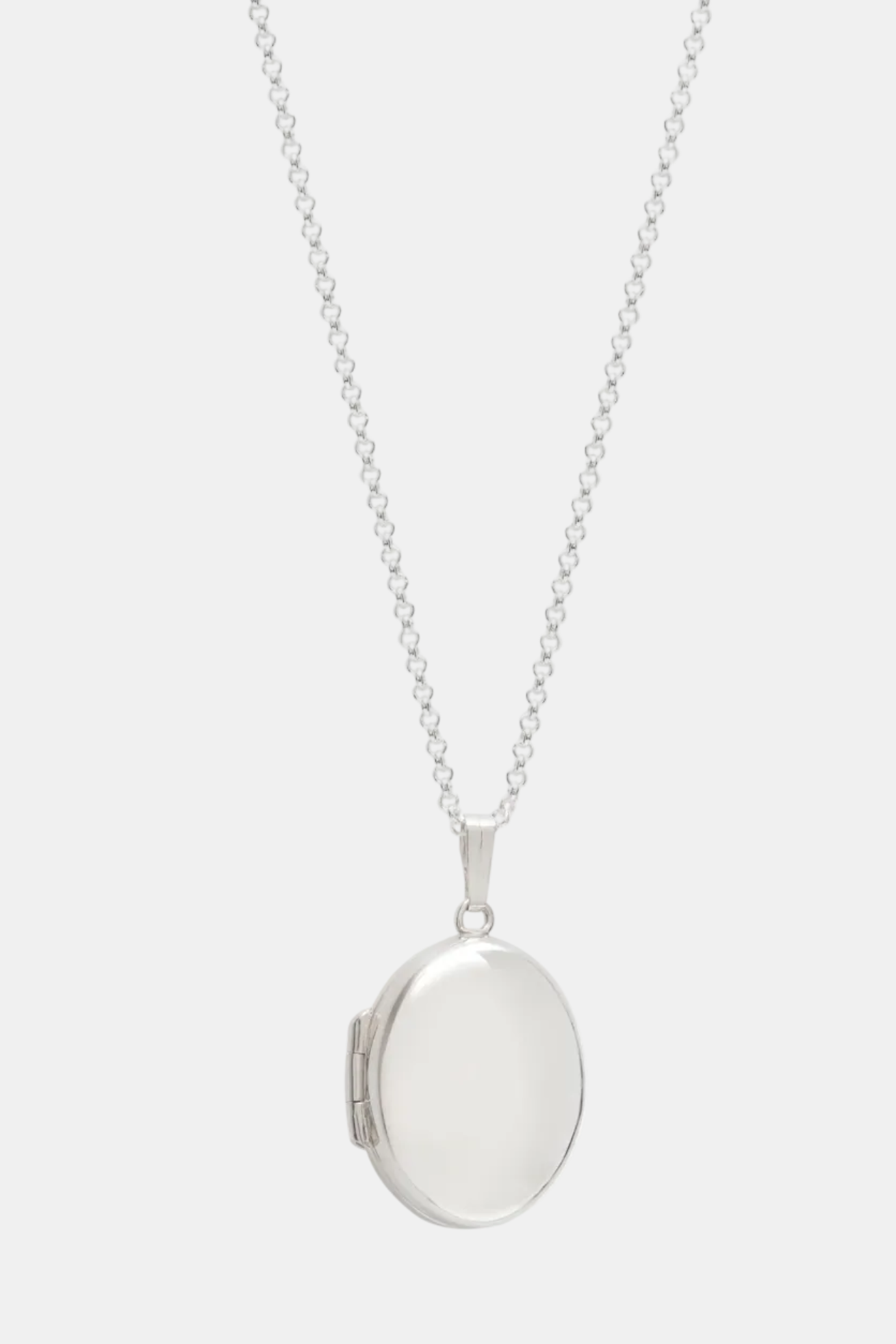 Silver locket necklace on a white background