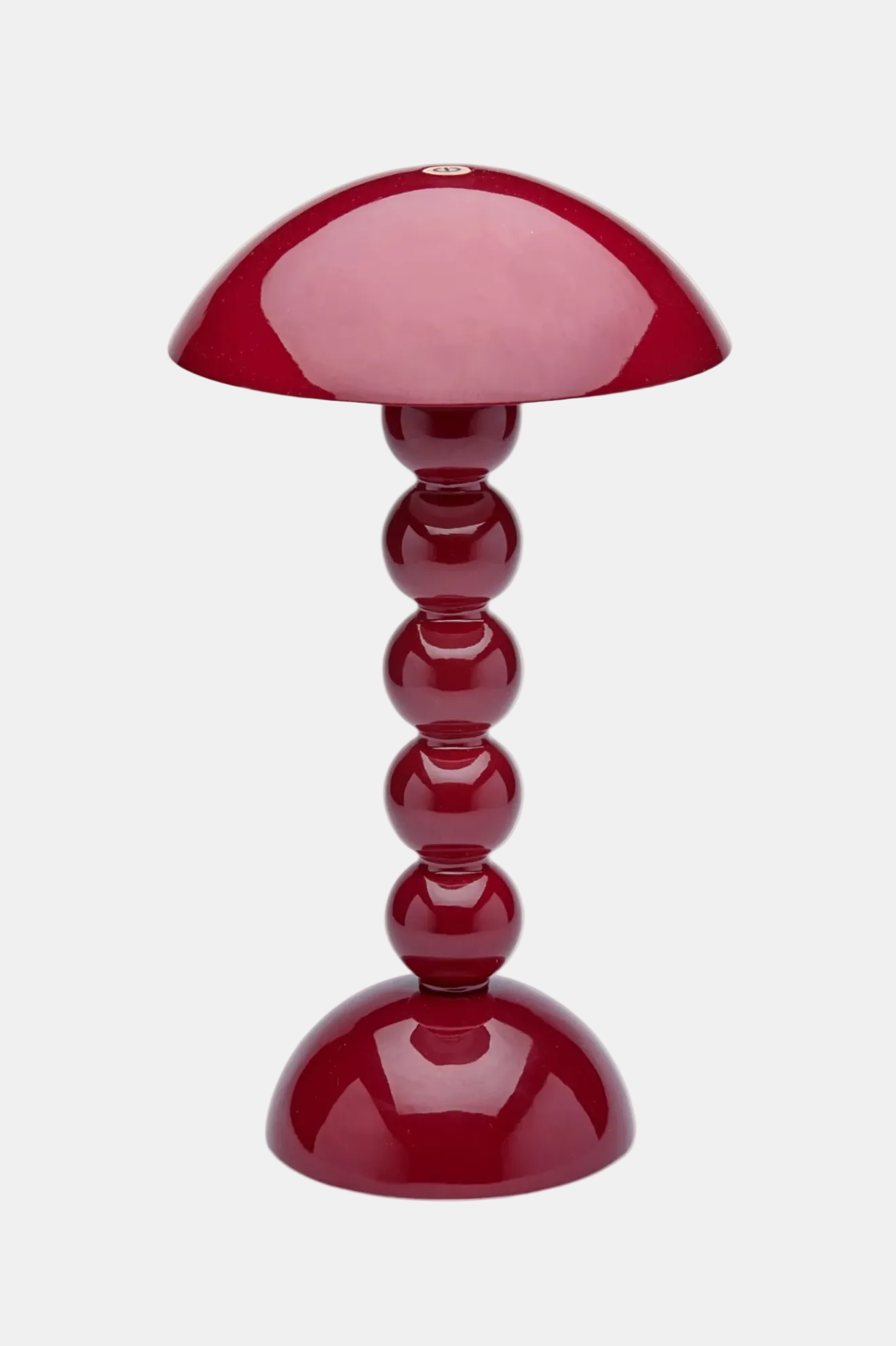 A glossy deep red table lamp with a dome-shaped shade, a multi-bulb ball stem, and a round base, isolated on a white background.