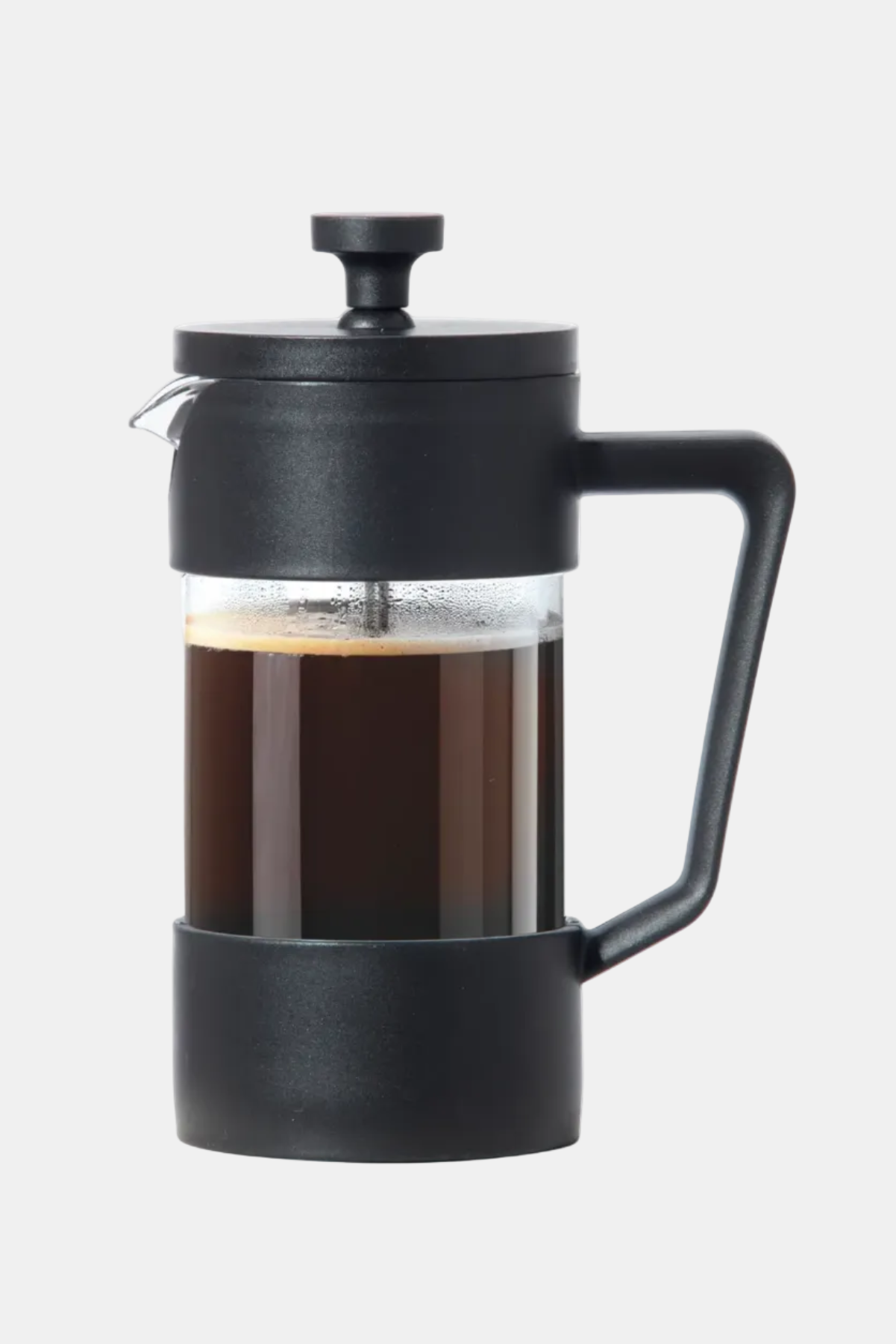 Black French press with coffee on a white background