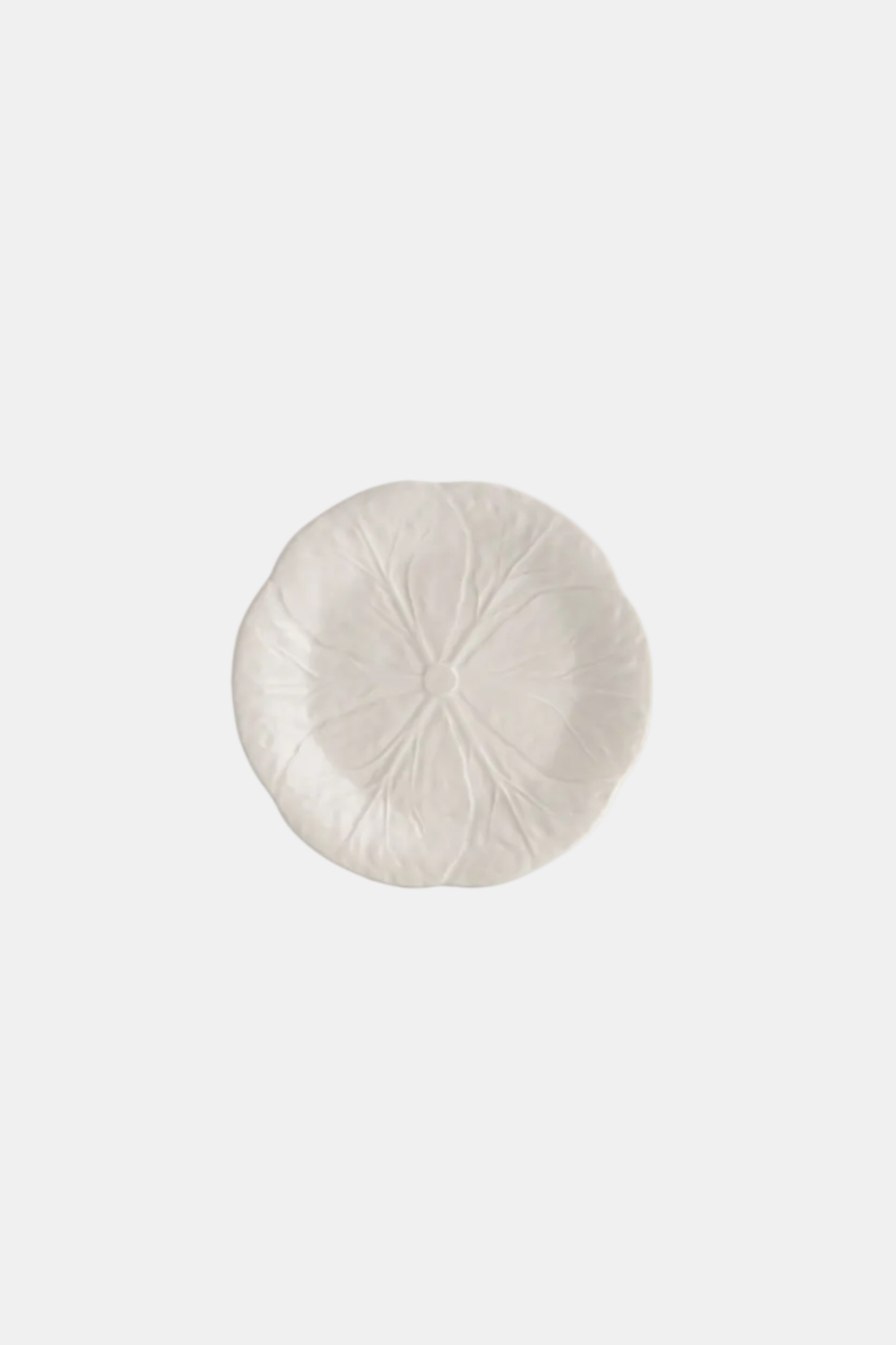Round white cushion on a white background