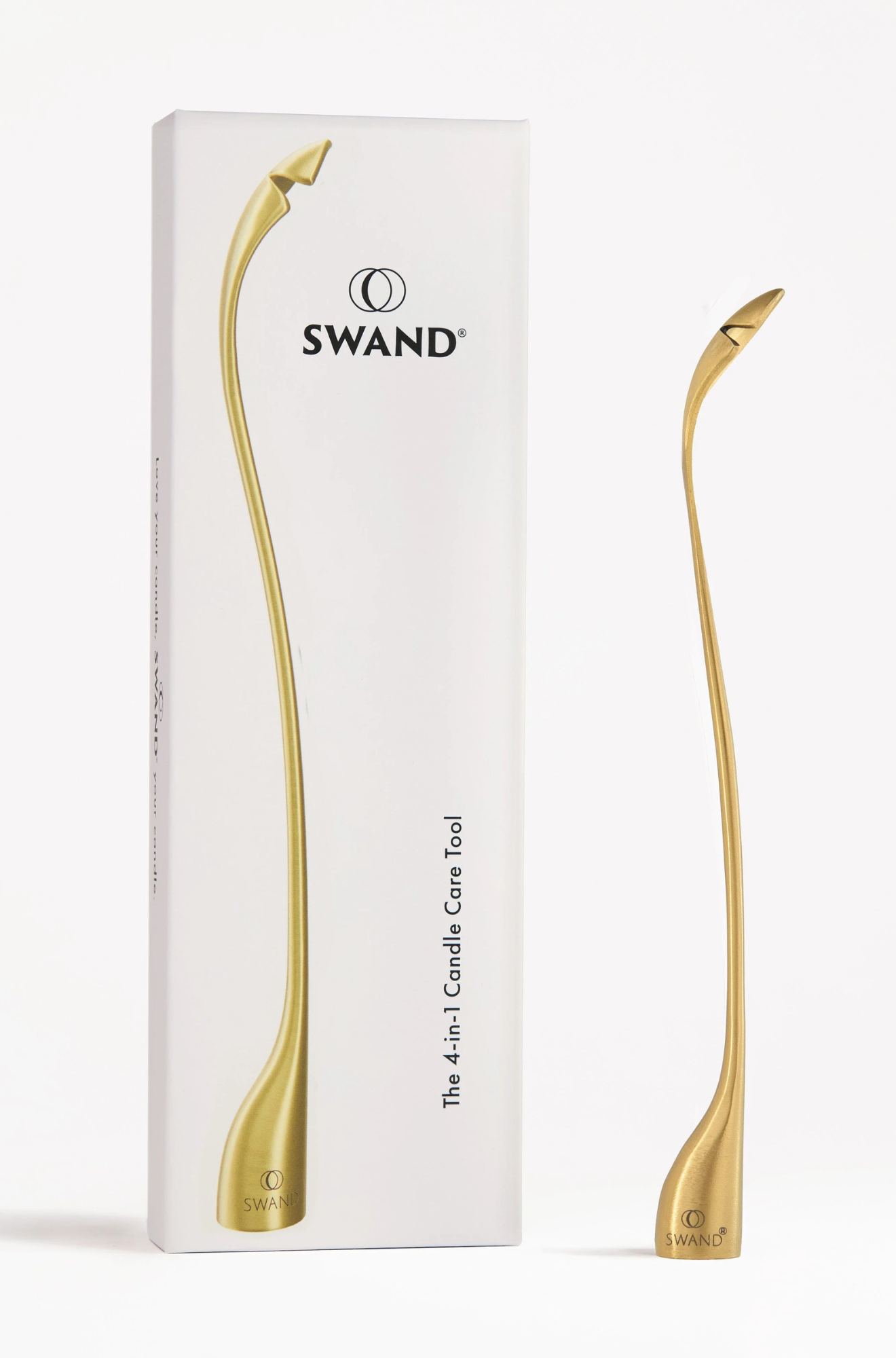 Gold candle care tool with Swand branding on a white background