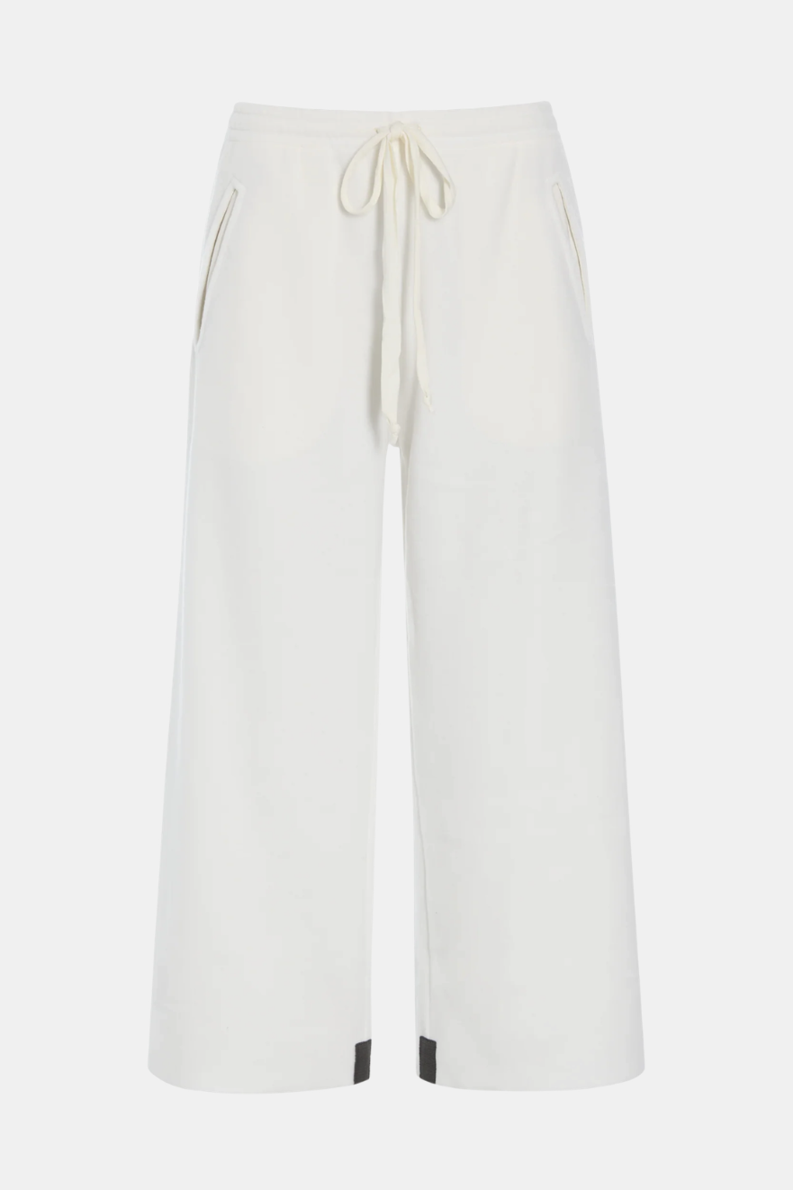 Off-white wide-leg cropped pants with a drawstring waist and side pockets, shown against a plain light gray background.