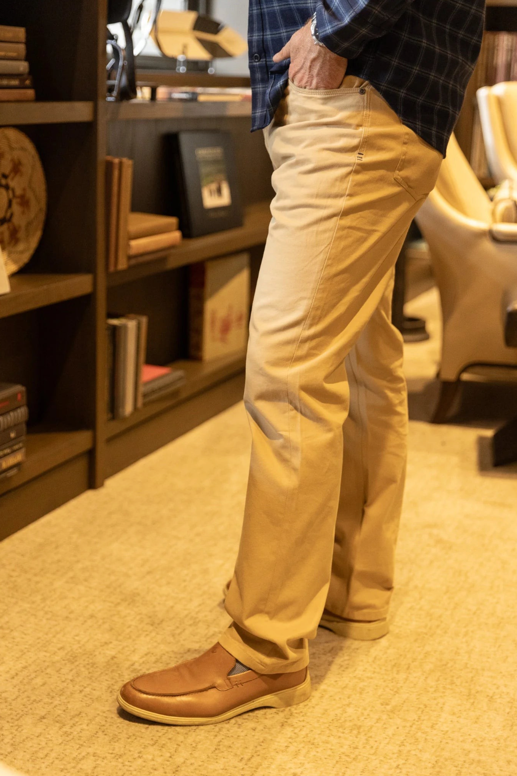 The Copper Shed Breakout broken twill pants in tan, featuring a tapered fit and 5-pocket styling on a standing model.