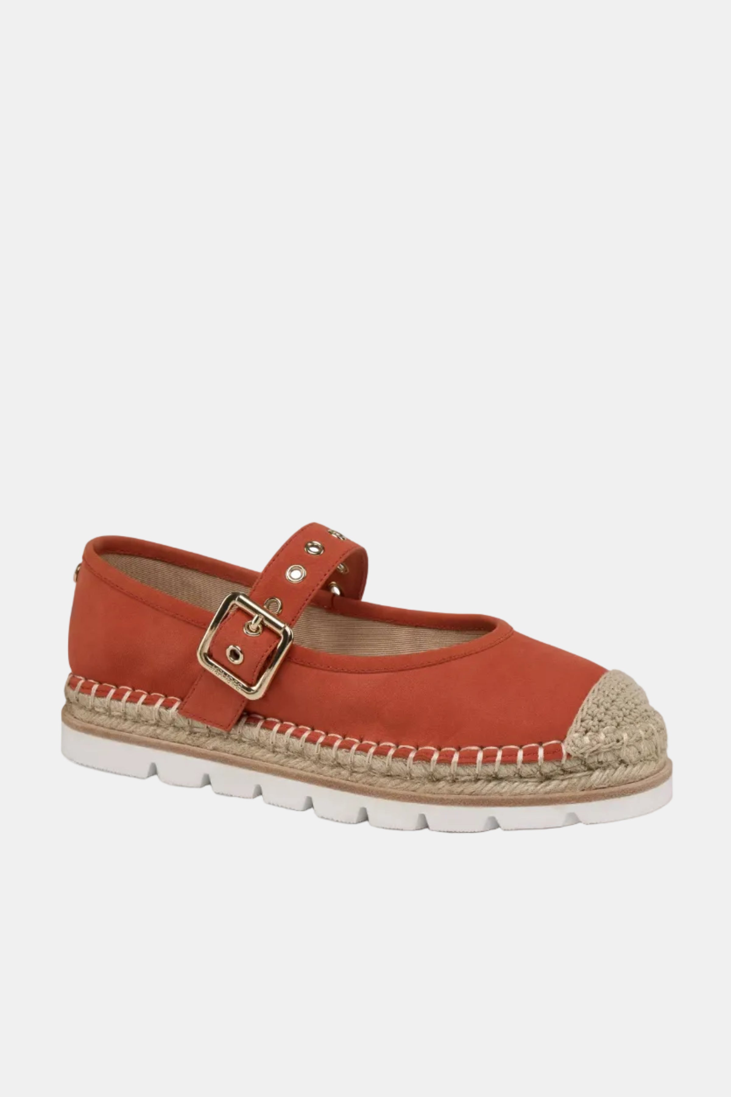Red espadrille shoe with a gold buckle on a white background