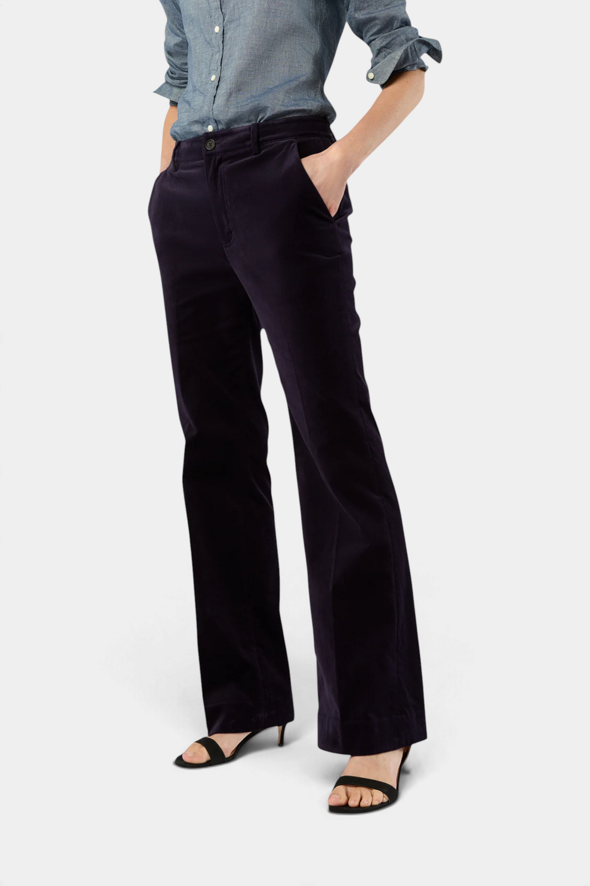 Ann Mashburn Lindy high-rise trousers in dark purple stretch velveteen with a flared leg and front slant pockets.