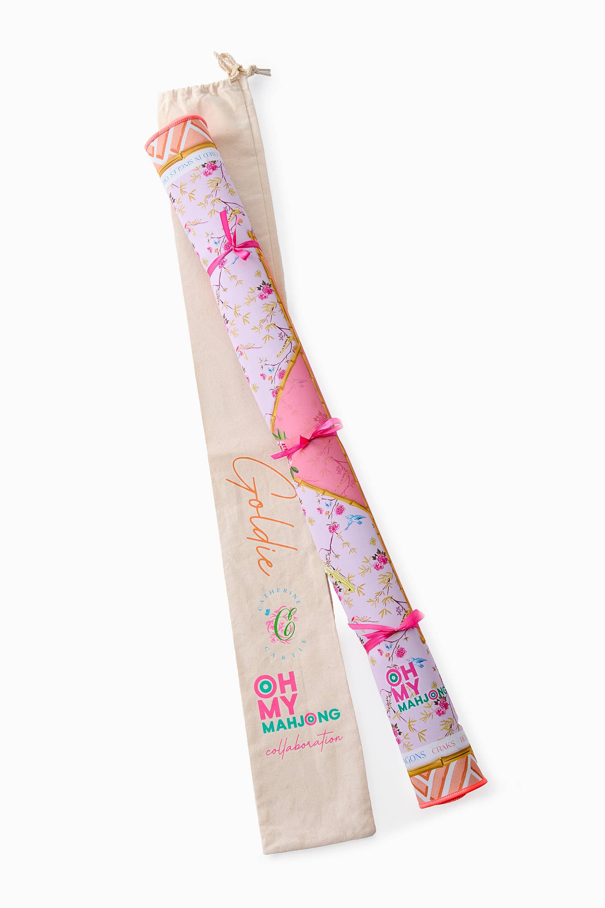 Decorative roller with floral design and 'Oh My Manu' text on a white background