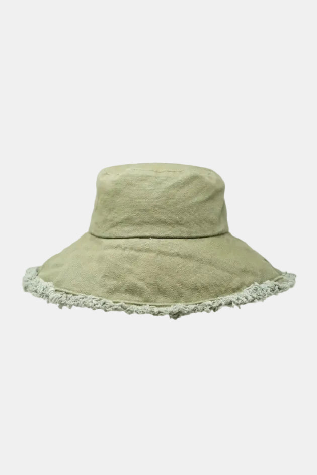 Green bucket hat with lace trim on a white background