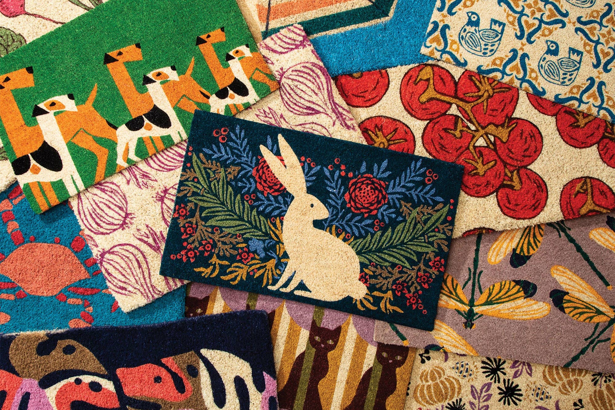 Collection of colorful fabric swatches with various patterns and animals.
