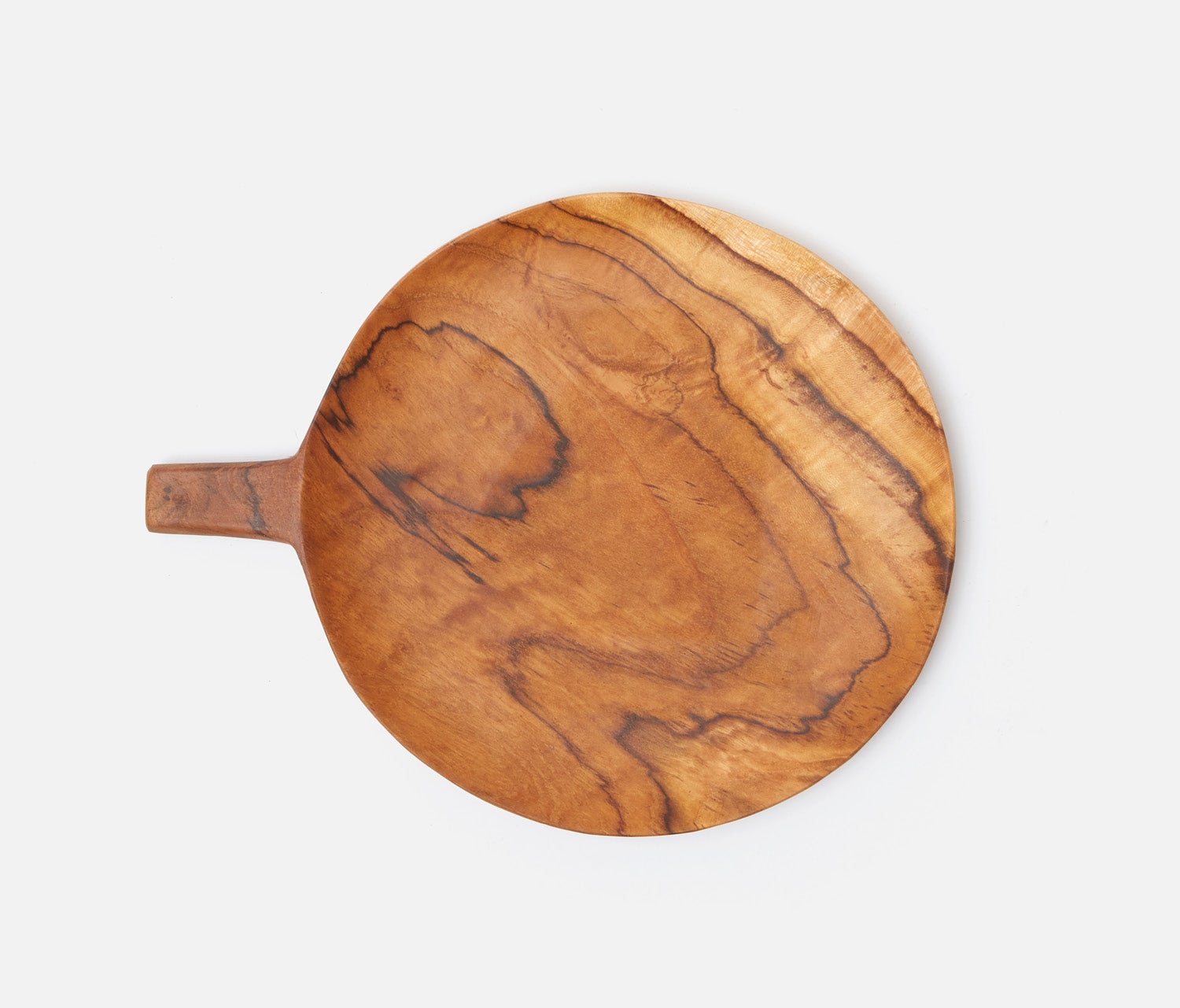 A round wooden serving board with a natural wavy grain pattern and a short handle on the left, shown on a light gray background.