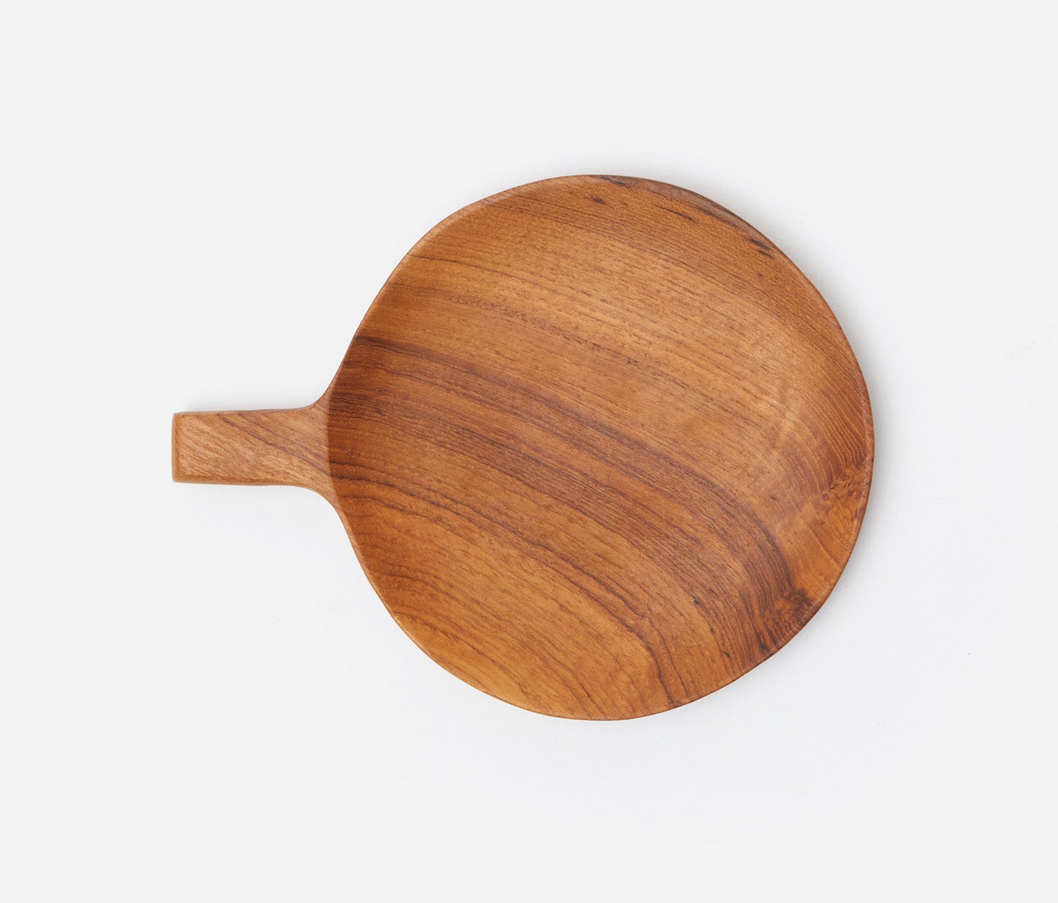 A round wooden serving board with a handle, made of medium brown wood with visible grain patterns, photographed from a top-down perspective on a light gray background.