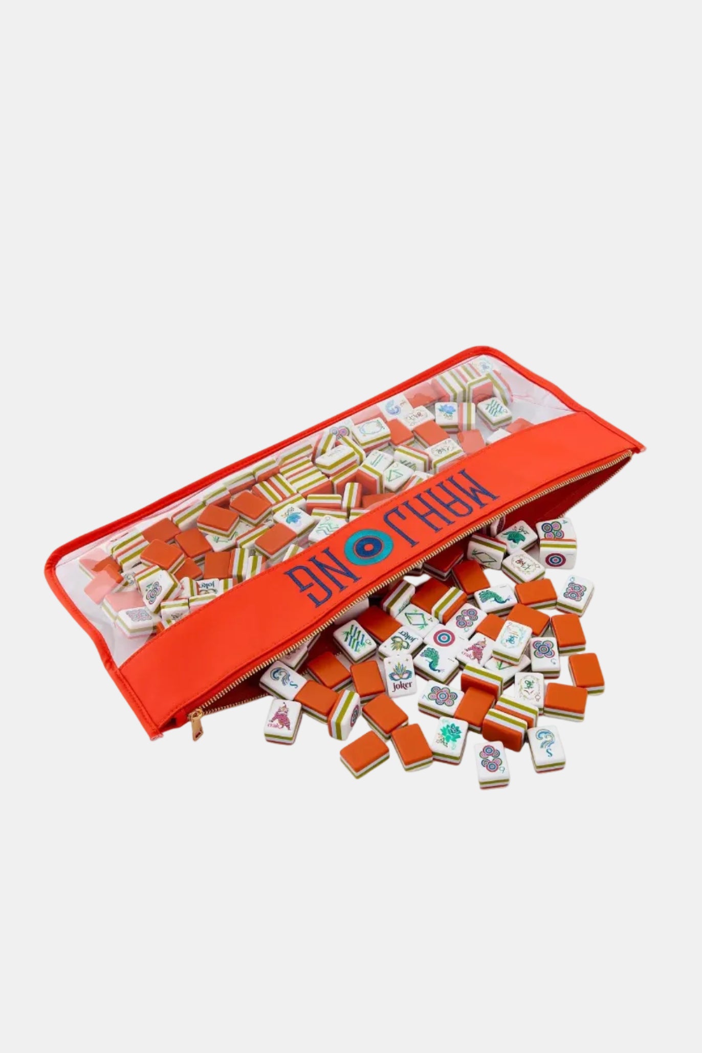 Mahjong game set with tiles and red carrying case on a white background
