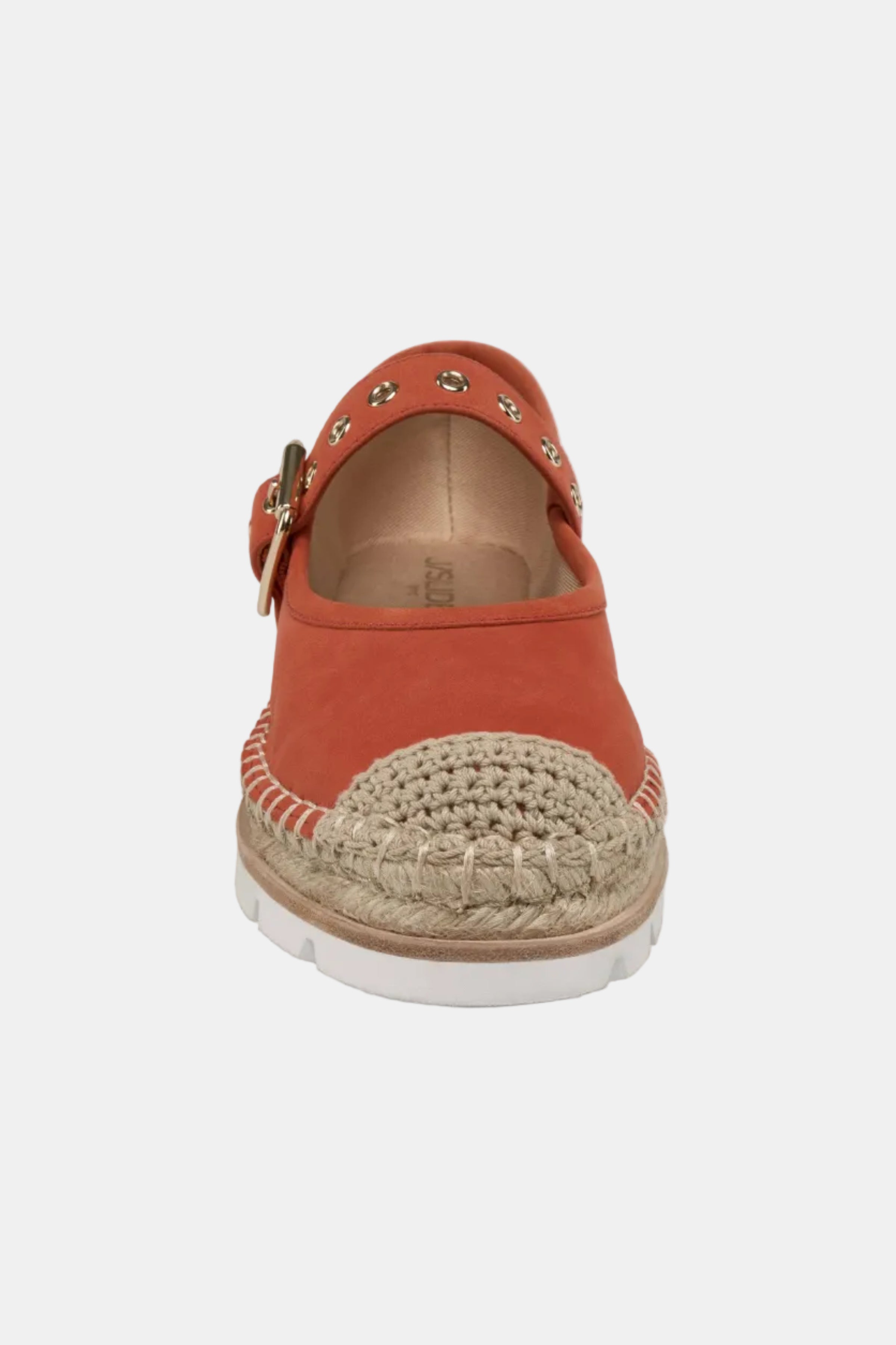 Orange espadrille shoe with jute sole on a white background