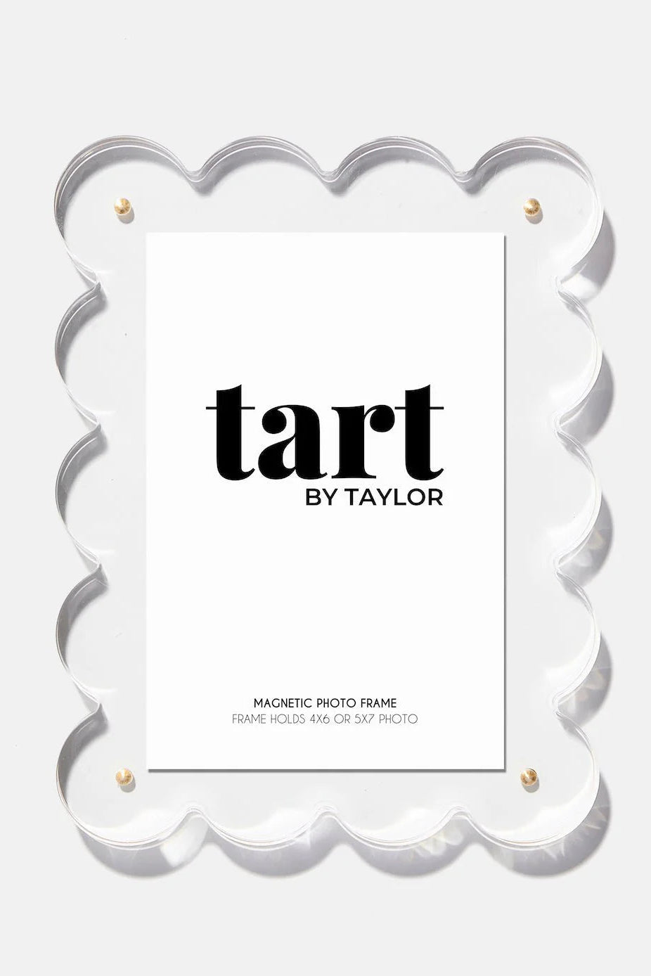 Magnetic photo frame with 'tart by Taylor' branding on a white background
