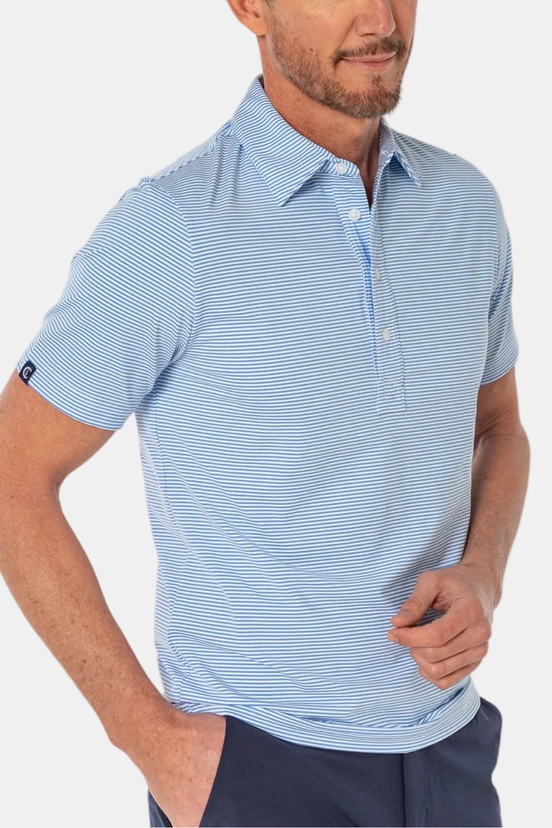 Man wearing a light blue striped polo shirt on a white background
