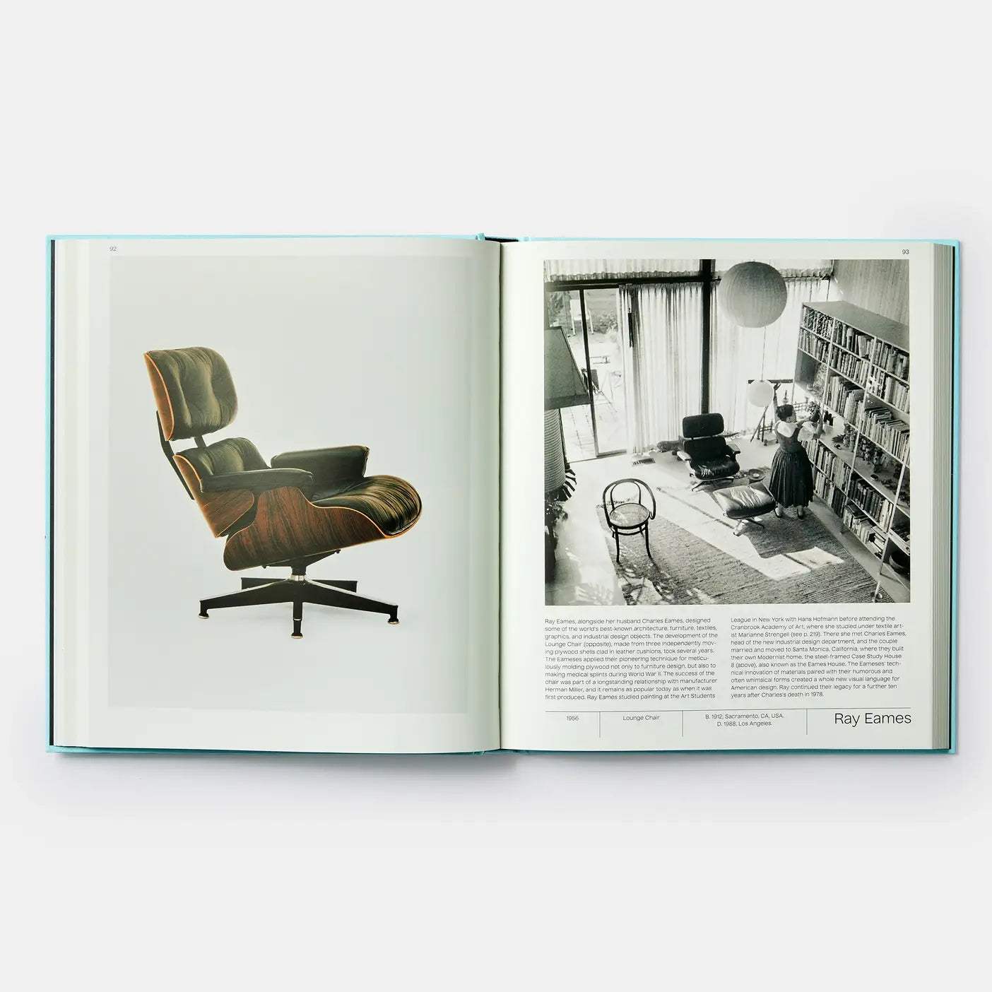 Open book showing a chair design and a black and white photo of a room with furniture.