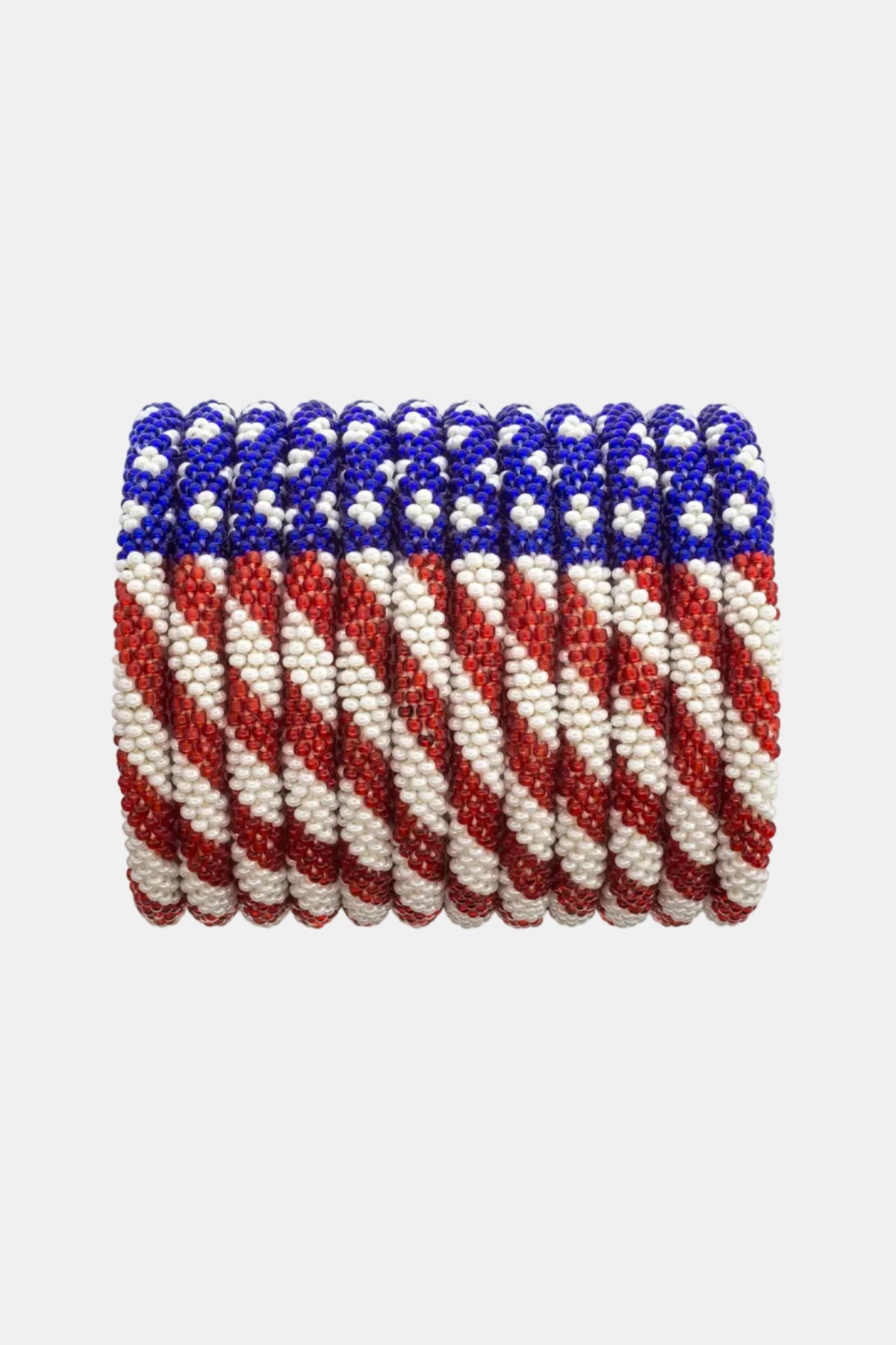 Coiled rope with red, white, and blue pattern on a white background