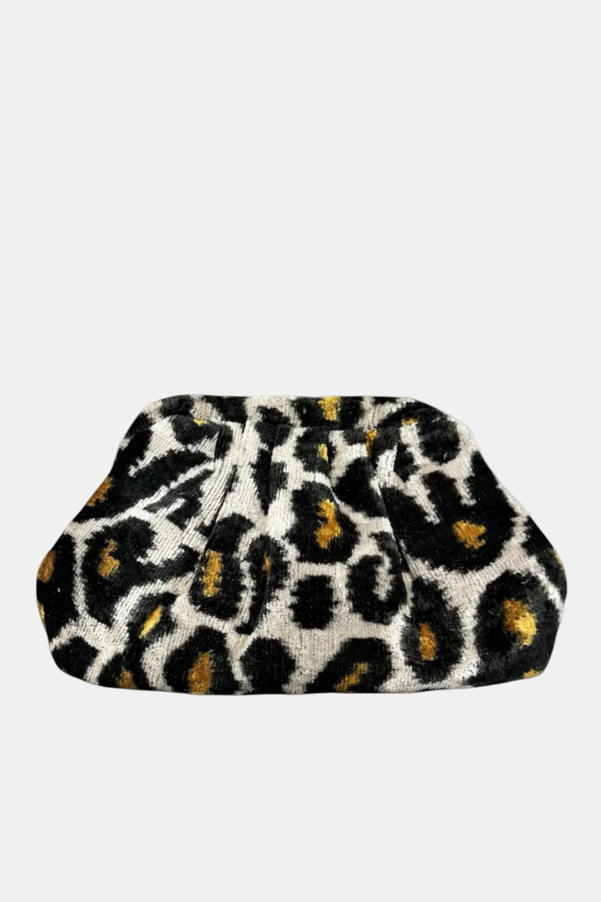 A leopard print clutch purse with a textured, plush fabric finish. The pattern features black and brown spots on a cream background, set against a solid white studio backdrop.