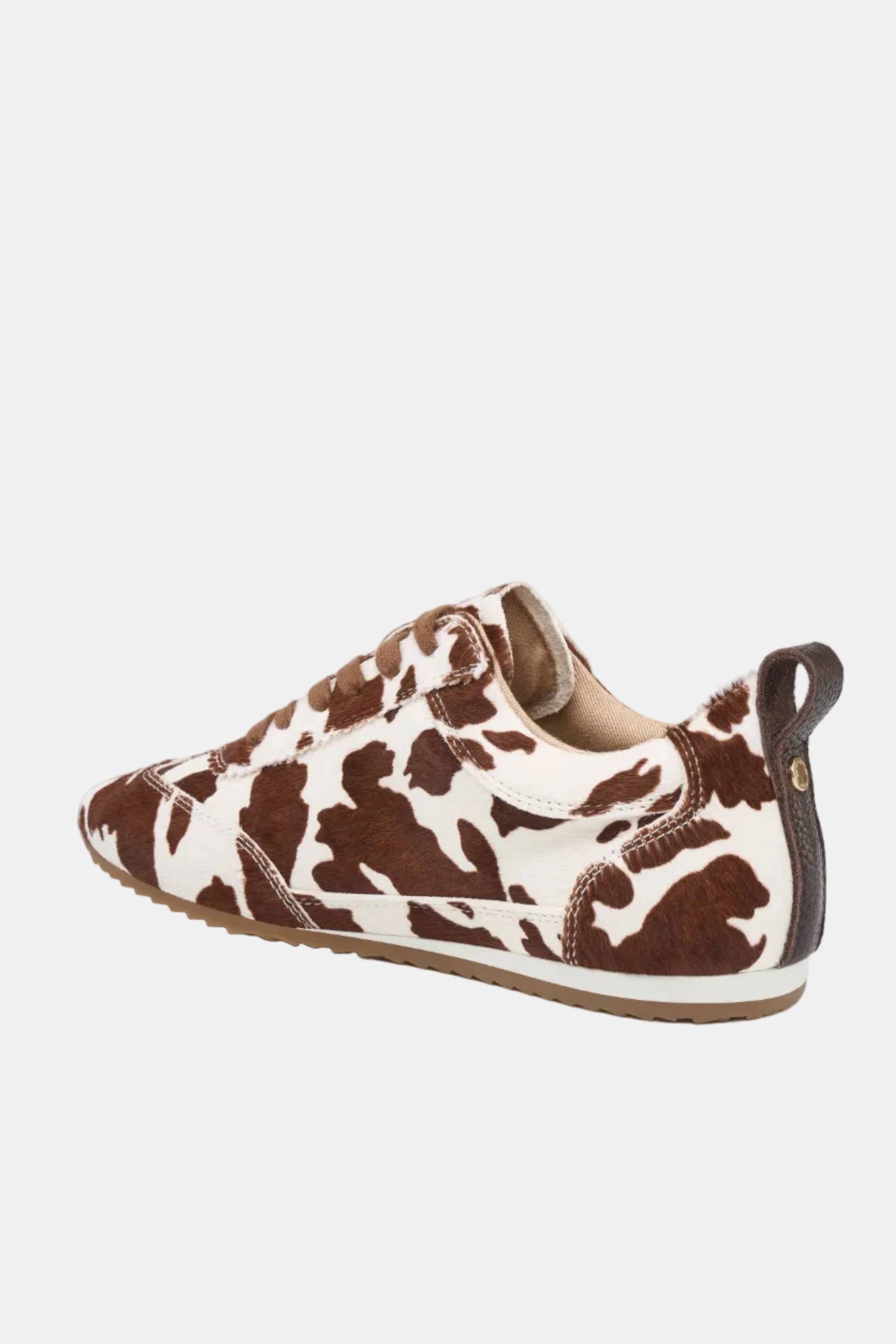 Brown and white cow print sneaker on a white background