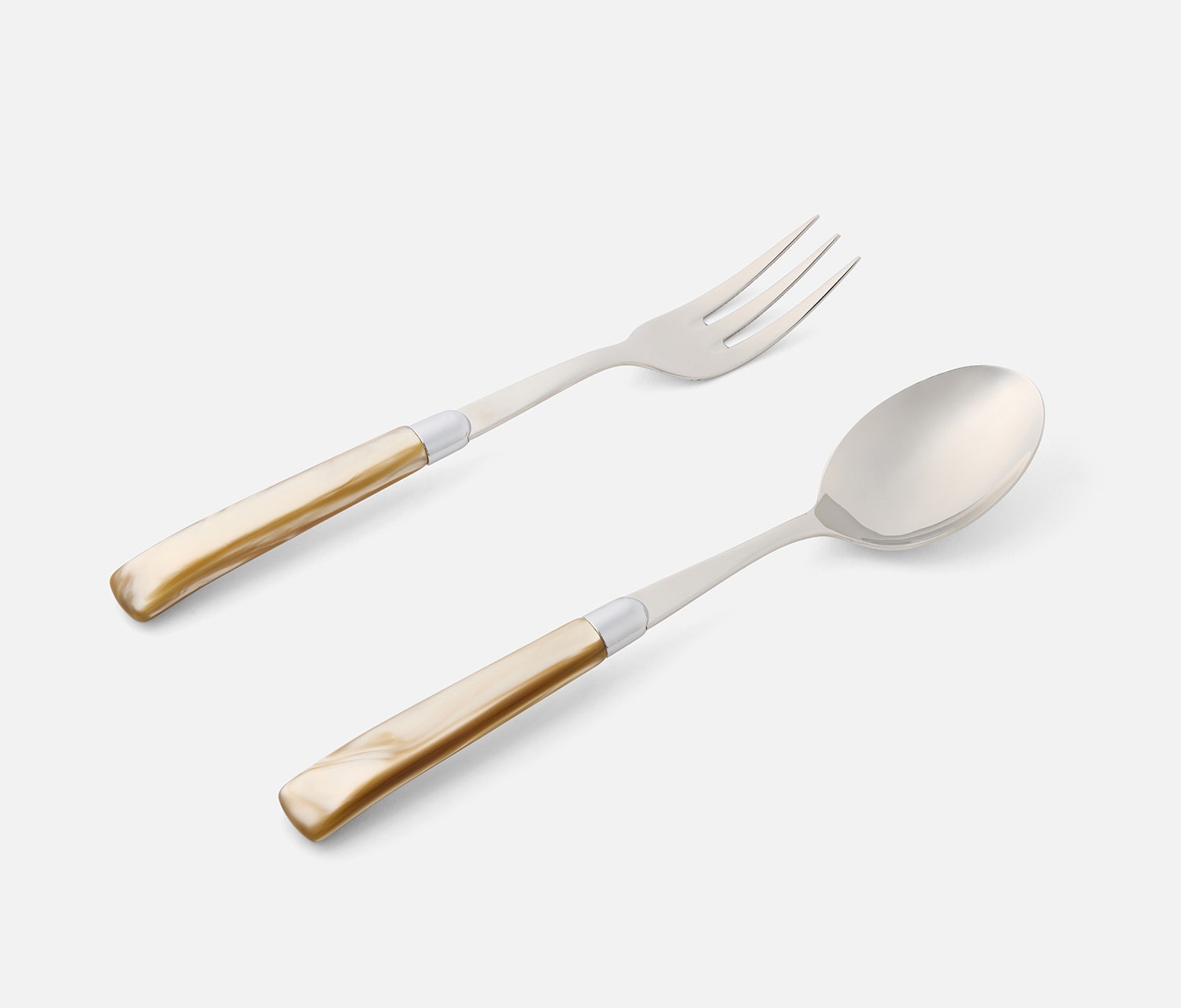 A flat lay of a stainless steel cutlery set featuring a fork and a spoon with polished gold handles, set against a clean, light gray background.