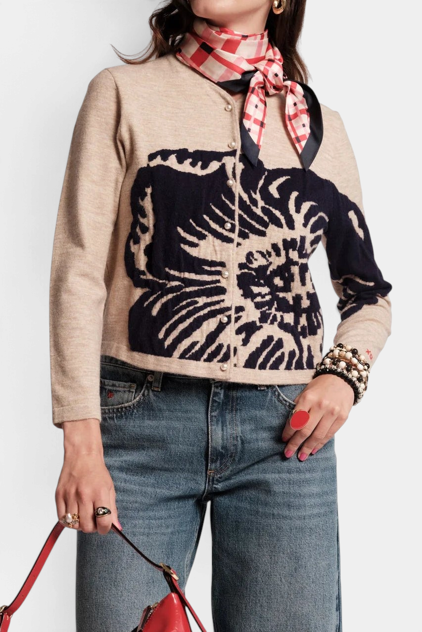 Frances Valentine Darling cardigan in beige merino wool with a navy floral print, pearl buttons, and bracelet sleeves.