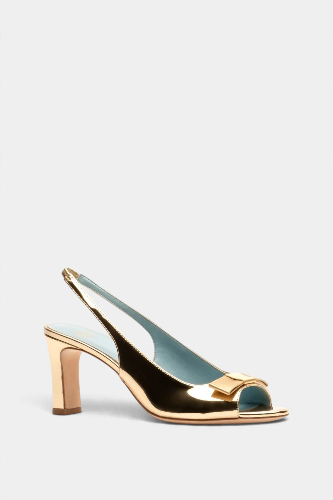 Frances Valentine Reese gold mirror leather slingback heel with a satin bow and open-toe design.