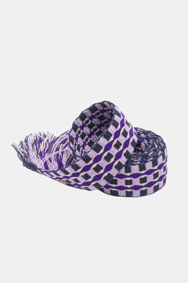 Purple and black patterned cowboy hat on a white background
