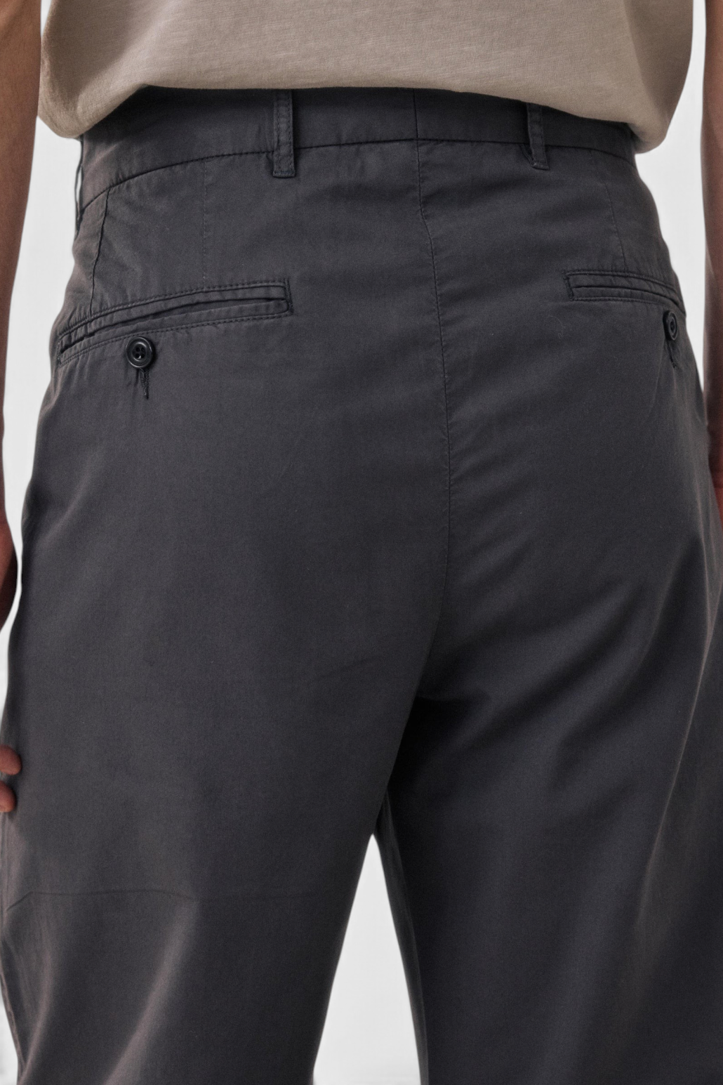 The Copper Shed Taylor charcoal grey cotton chino pants with back welt pockets and belt loops, rear view.