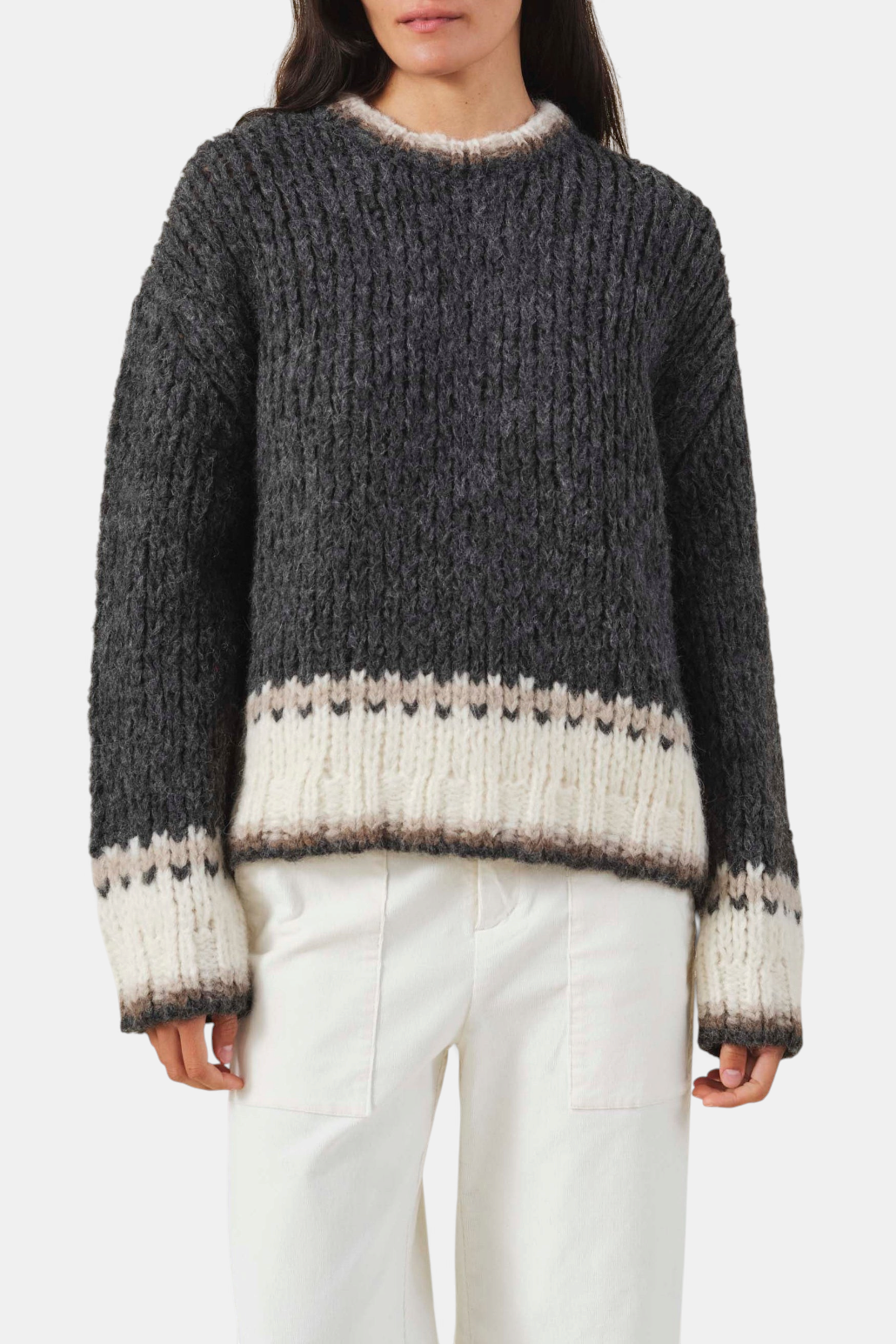 The Copper Shed charcoal and cream alpaca blend Fair Isle sweater with a crew neckline and chunky knit texture.