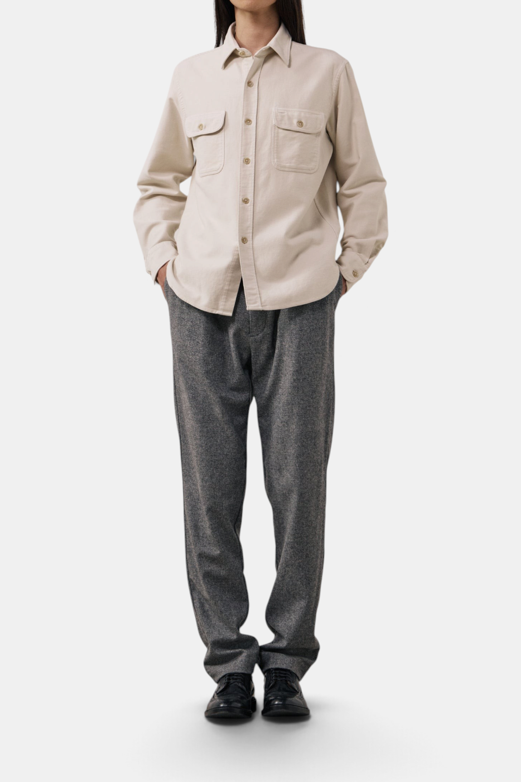 The Copper Shed Paco beige brushed cotton flannel shirt with double chest pockets and classic collar on a model.