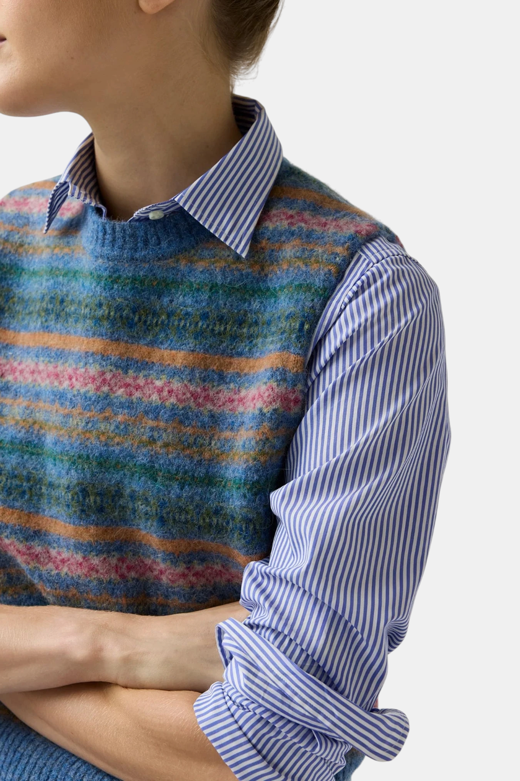 The Copper Shed Silvia Fair Isle sweater vest in brushed alpaca wool blend with multi-colored striped pattern.