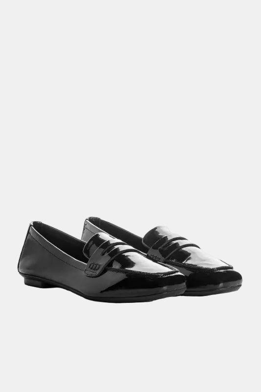 Pair of black patent leather loafers on a white background