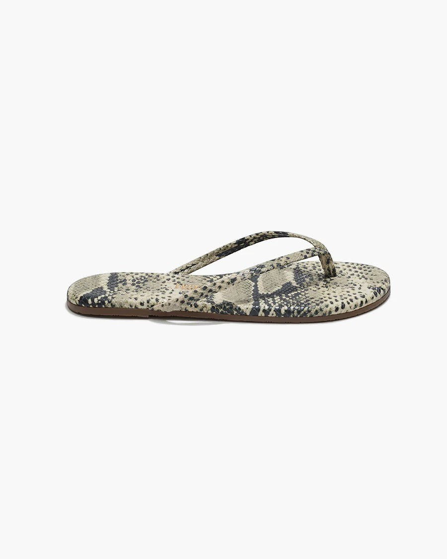 The TKEES Lily Flip Flop in a snakeskin print. These comfortable leather-like flip flops feature a cushioned insole and rubber outsole.
