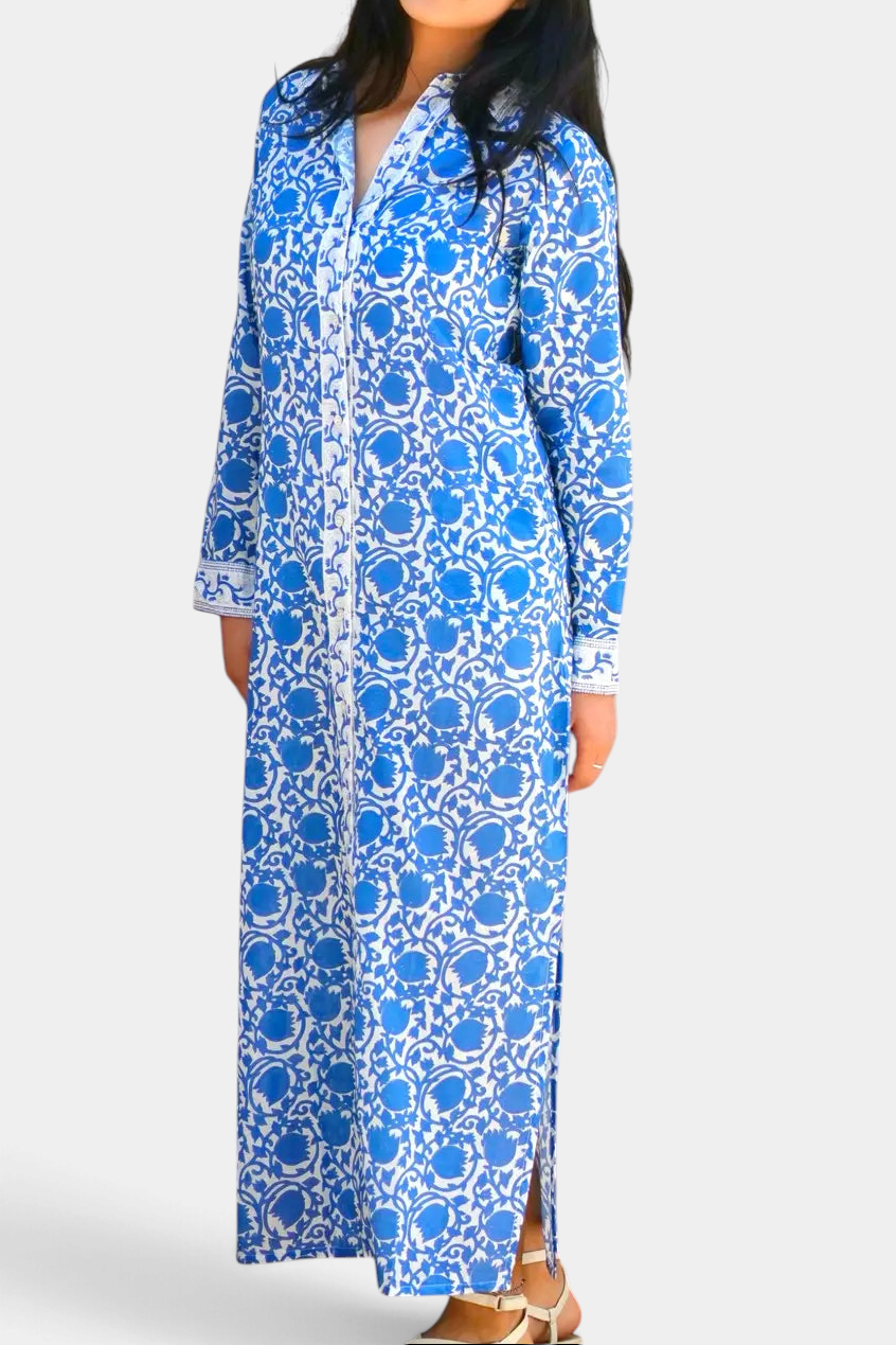 The Copper Shed Adriana long sleeve maxi shirt dress in blue and white floral cotton with a collared neck and side slits