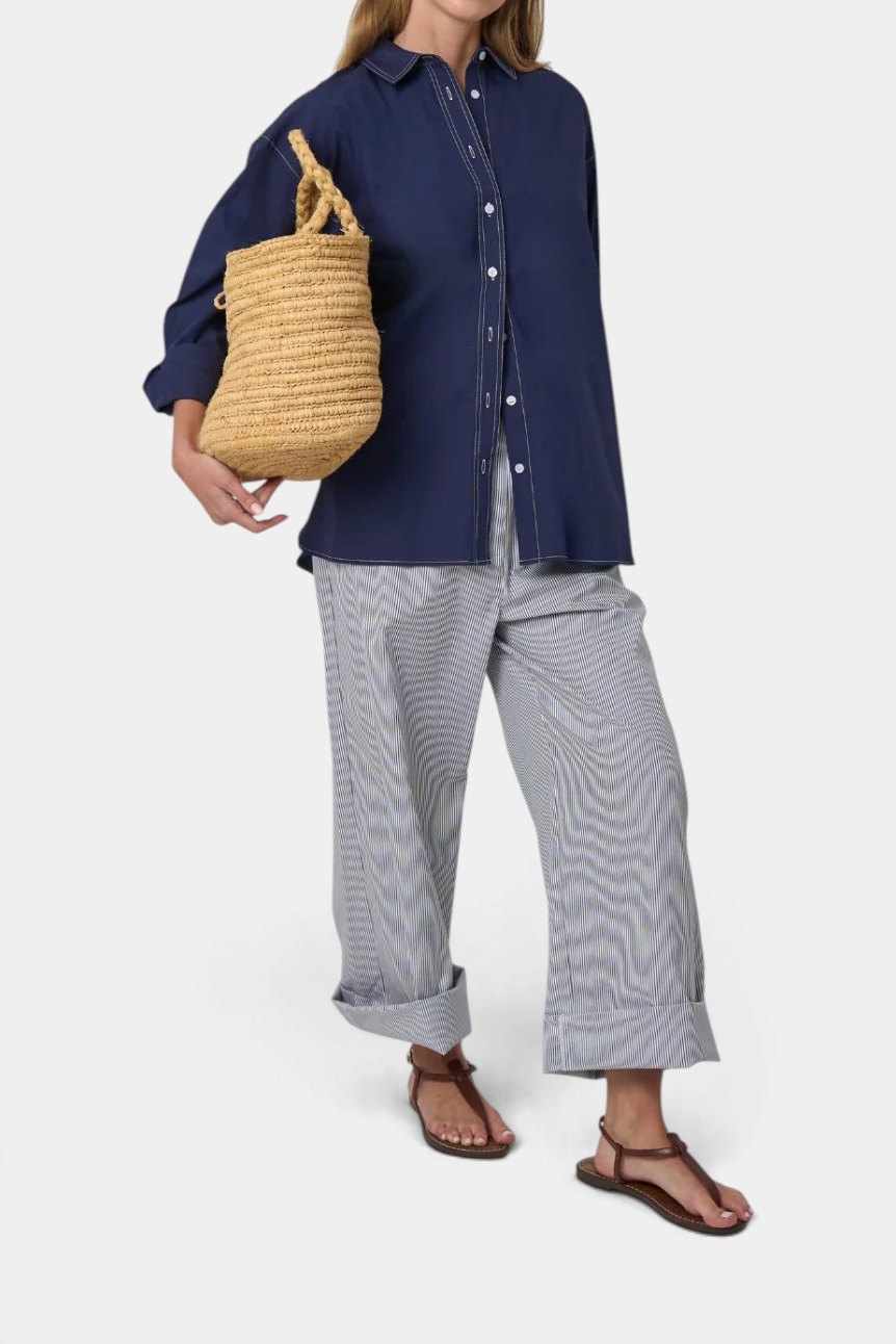 The Copper Shed Alyssa drawstring cotton pants in blue and white pinstripe with a straight-leg fit and cuffed hem.