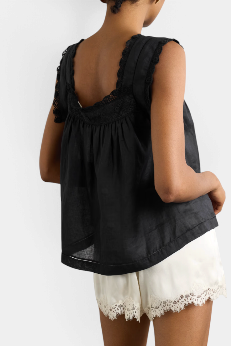 The Copper Shed DÔEN Aphra top in black ramie with delicate crochet trim on the yoke and sleeves, back view.