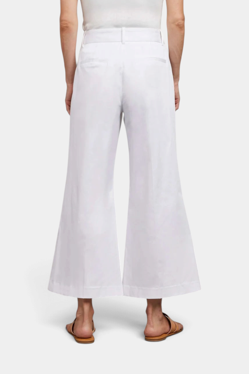 Back view of The Copper Shed Aria cropped wide-leg pants in white cotton twill with a high-rise waist.