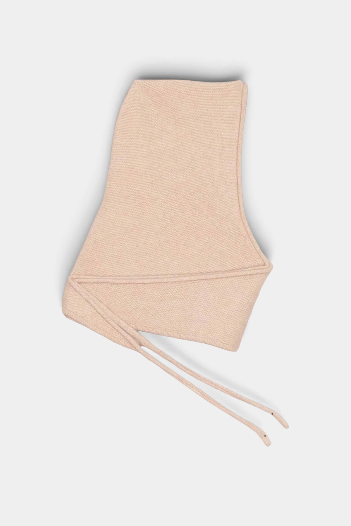 The Copper Shed Eden hooded scarf in soft beige organic cashmere with simple tie closures.