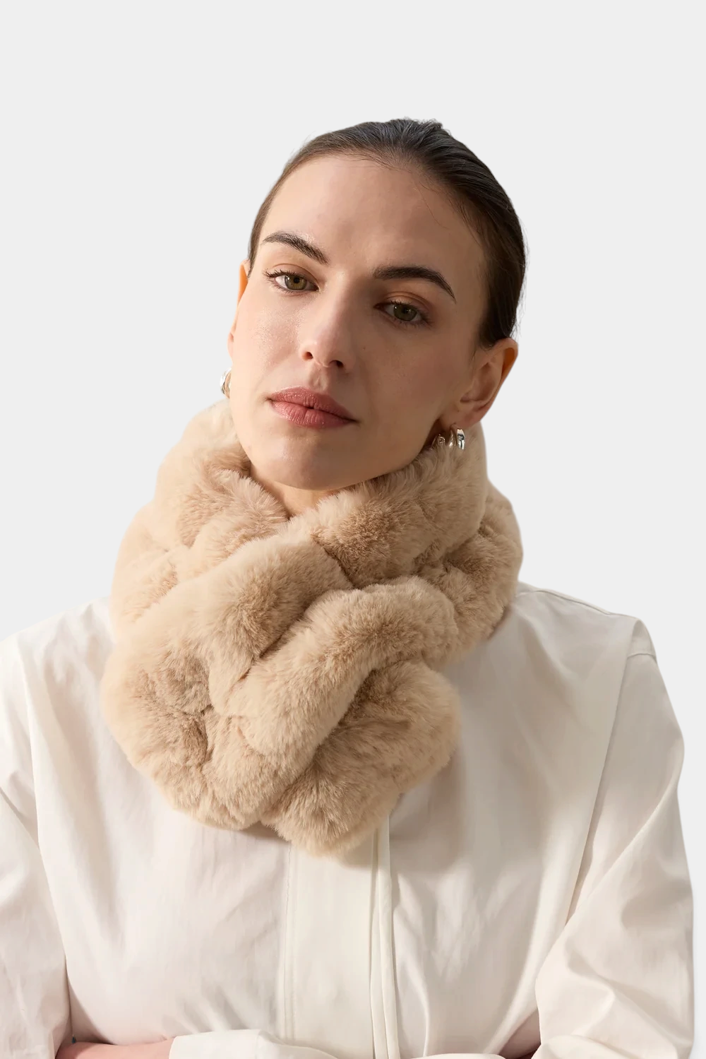 The Copper Shed beige ruffle scarf in ultra-soft cloud faux fur with a stretch-gathered design and elasticated loop.