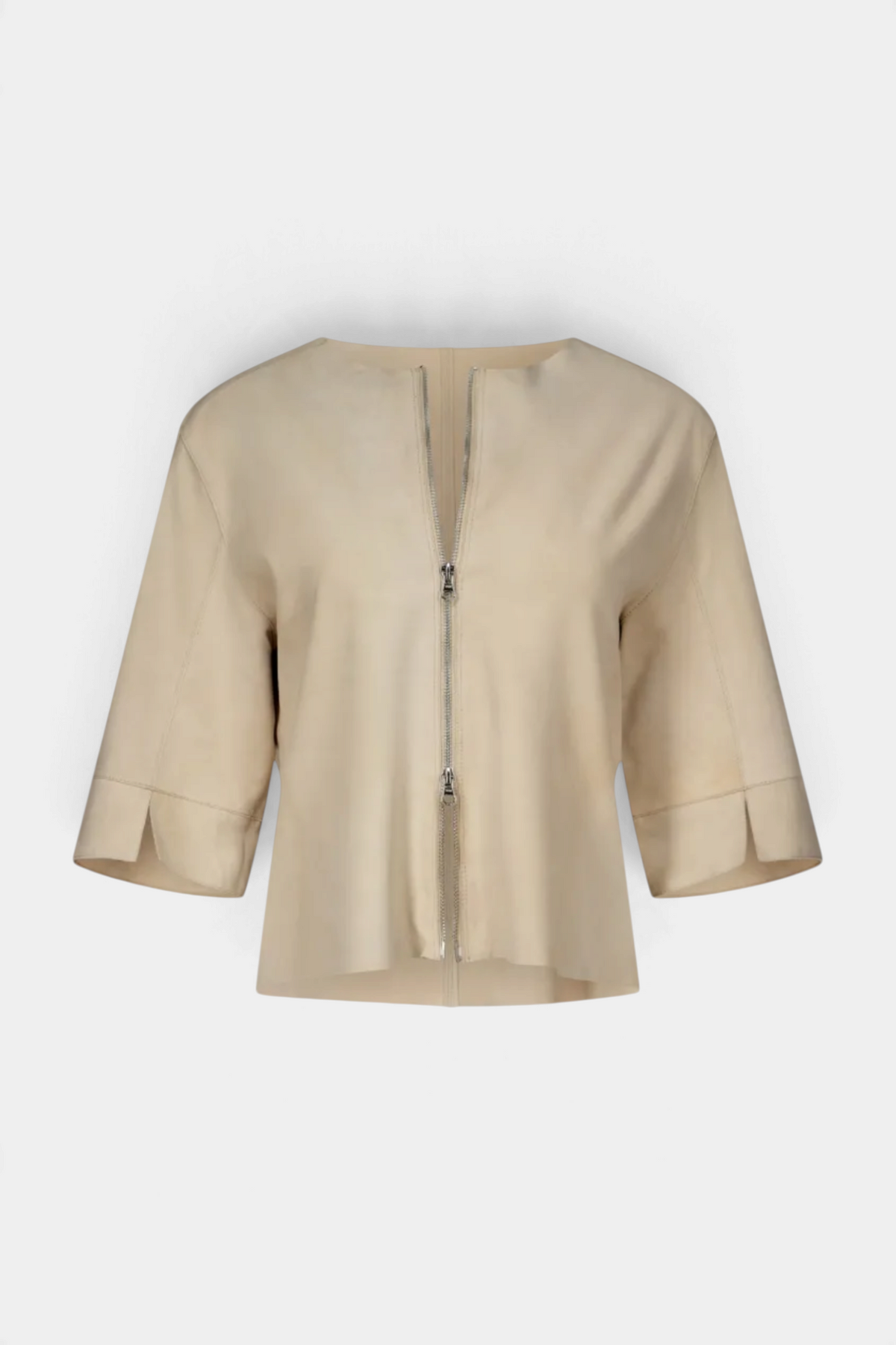 The Copper Shed Edith washed suede jacket in beige with a front zipper and three-quarter length sleeves.