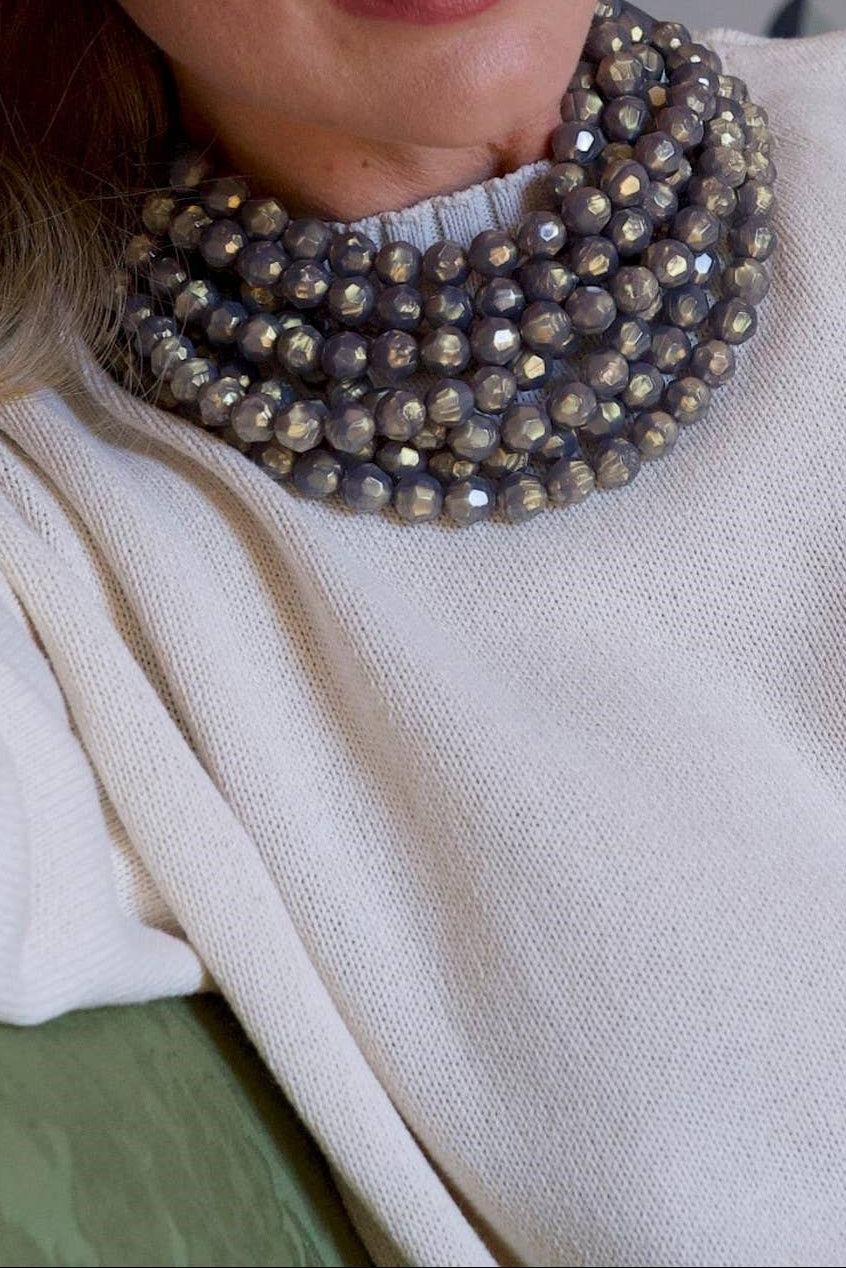 The Copper Shed Bella Grigio necklace featuring layered grey resin beads on a leather collar with magnetic closure
