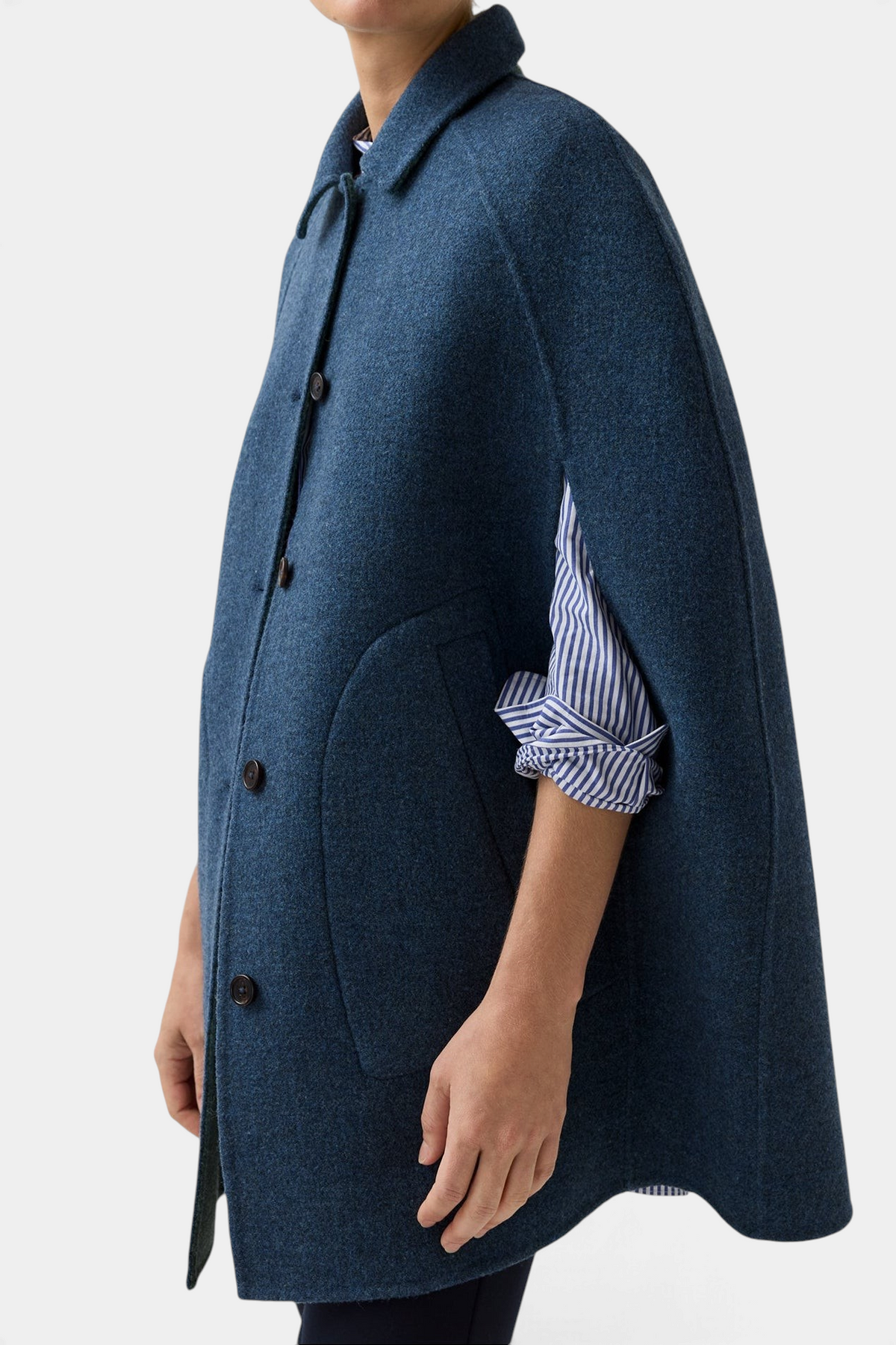 The Copper Shed Bennet tailored cape in blue herringbone Harris Tweed with a button front and felt undercollar.