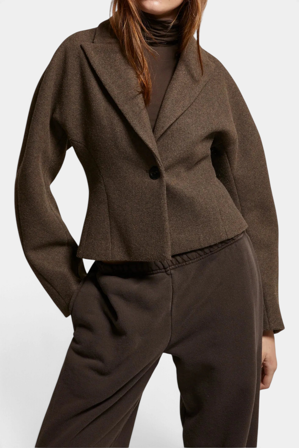The Copper Shed Bethany blazer in brown brushed felt with a cinched waist and single button closure.