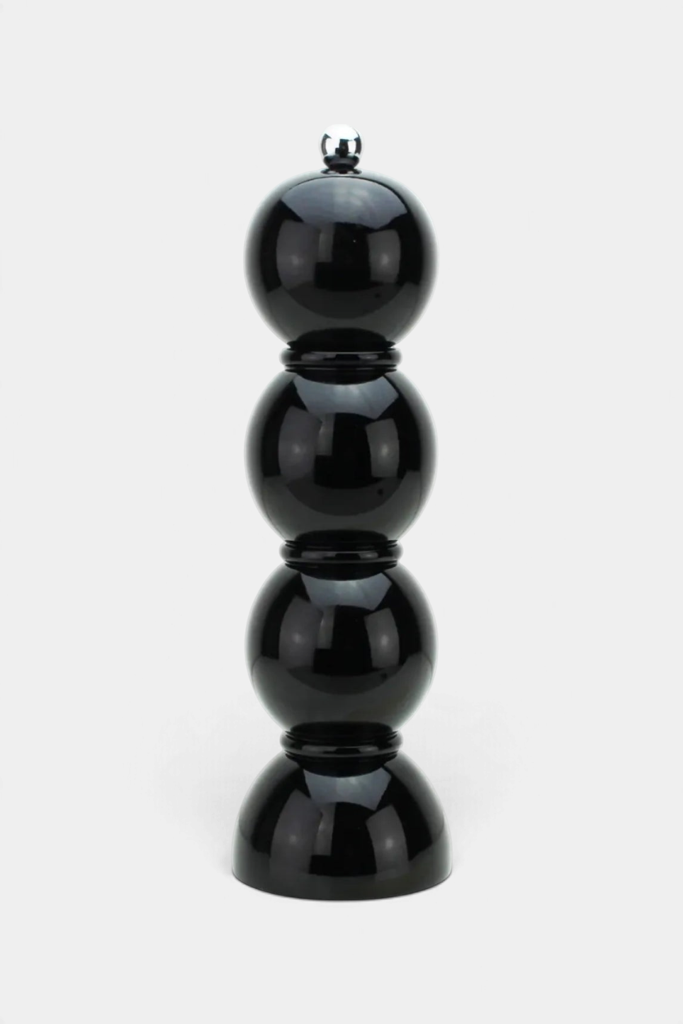 The Copper Shed 24cm black lacquered rubberwood bobbin salt or pepper mill with a polished stainless steel knob.