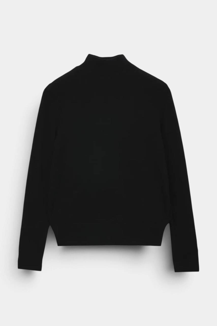 The Copper Shed black cashmere high neck long sleeve sweater with a relaxed fit and soft knit texture.