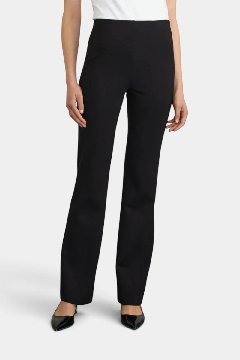 The Copper Shed black long flared pants in Japanese Ponte fabric with a fitted silhouette and side zipper.