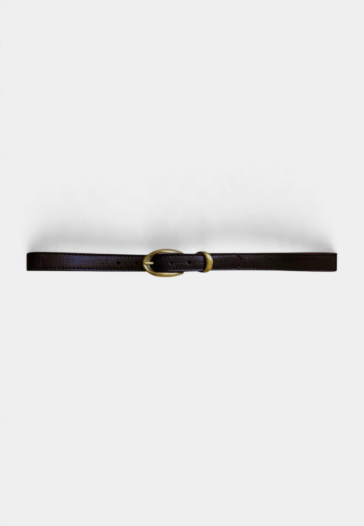 The Copper Shed black pebbled leather belt with an etched antique brass buckle and burgundy suede backing