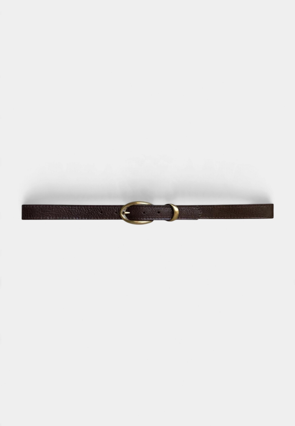 The Copper Shed black pebbled leather belt with an etched antique brass buckle and a cast keeper.