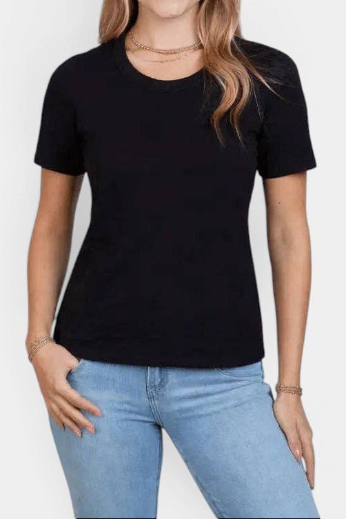 The Copper Shed black Pima cotton short sleeve tee with gathered shoulders and scoop neckline worn with blue jeans