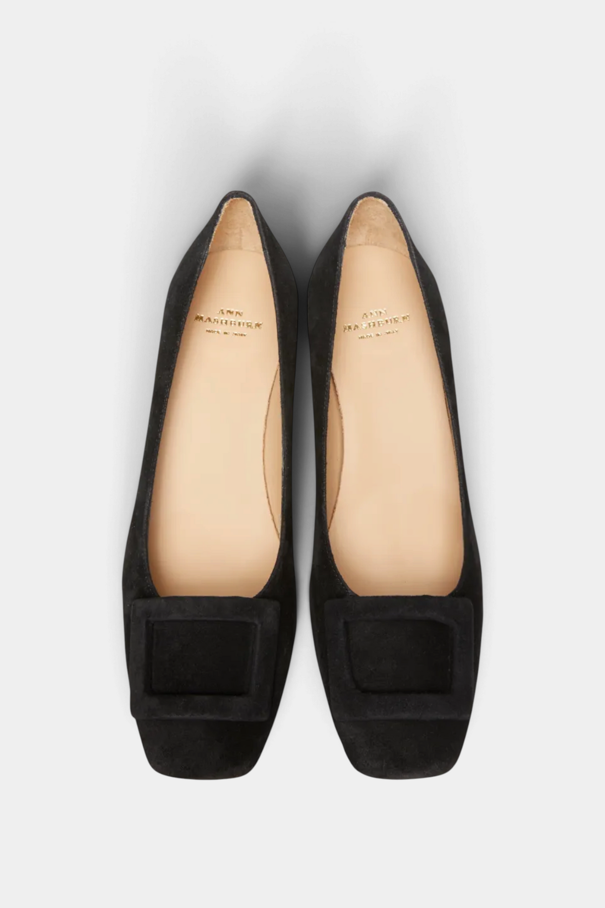 The Copper Shed black suede Buckle Heel shoes with a 50mm stacked heel, covered buckle, and cushioned leather insole.