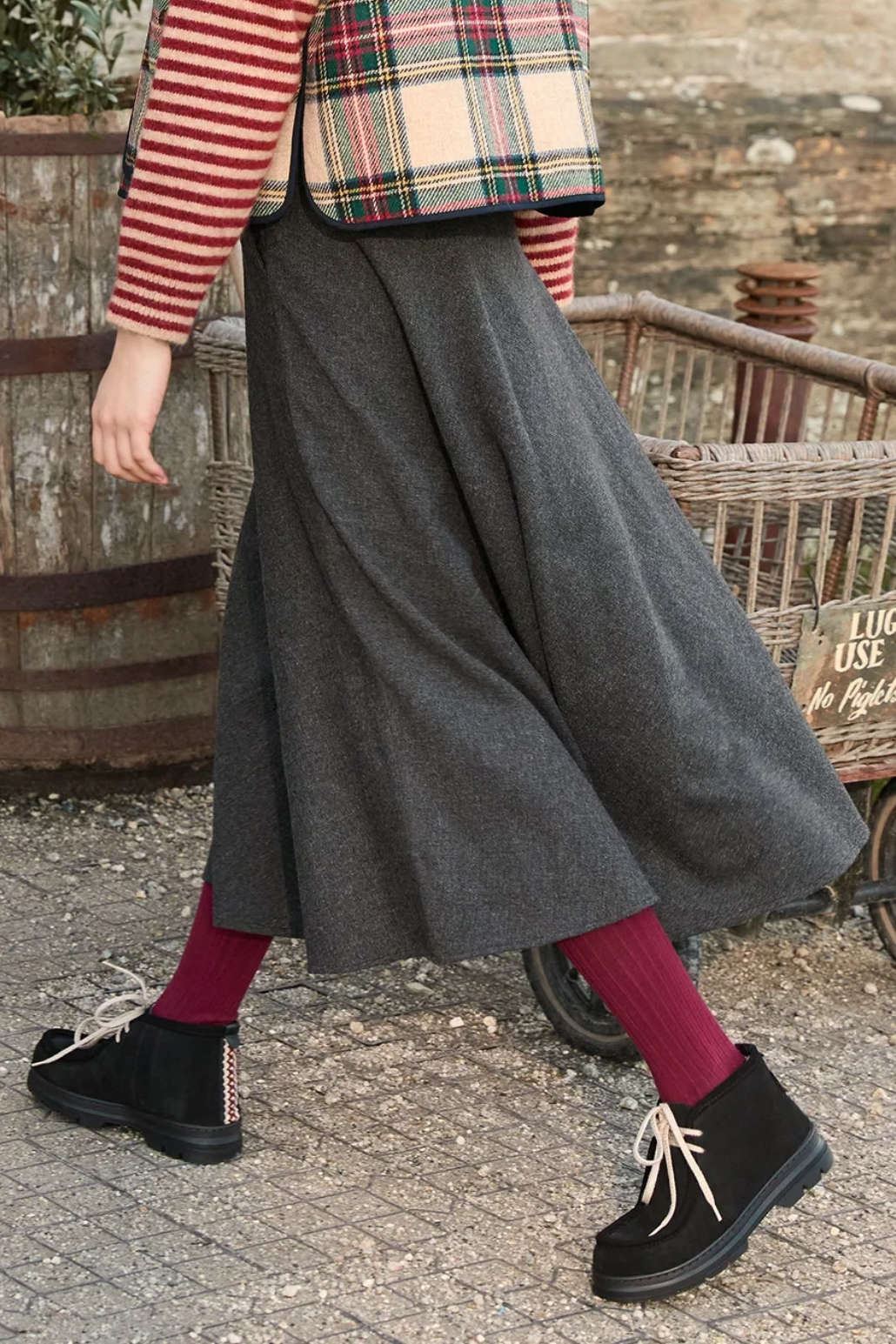 The Copper Shed Phenomenal black split suede shearling-lined boots with ecru laces and folk trim on the heel